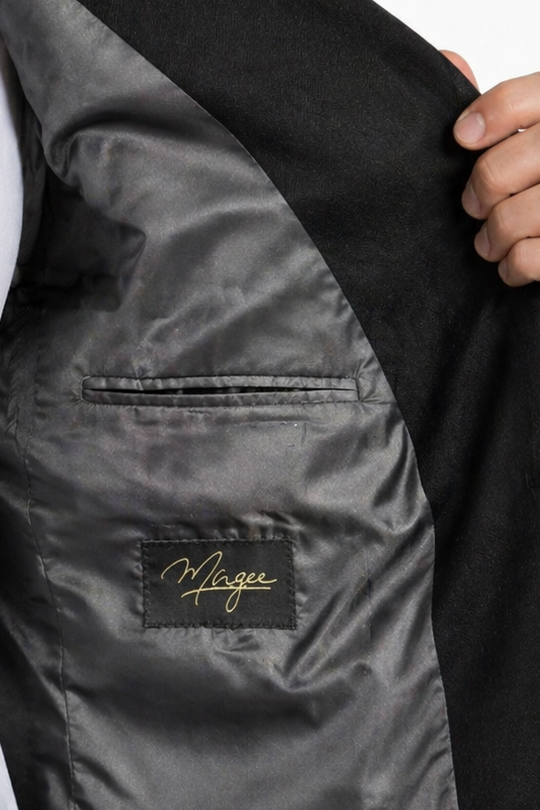 Black suit jacket with a visible brand logo on a white background